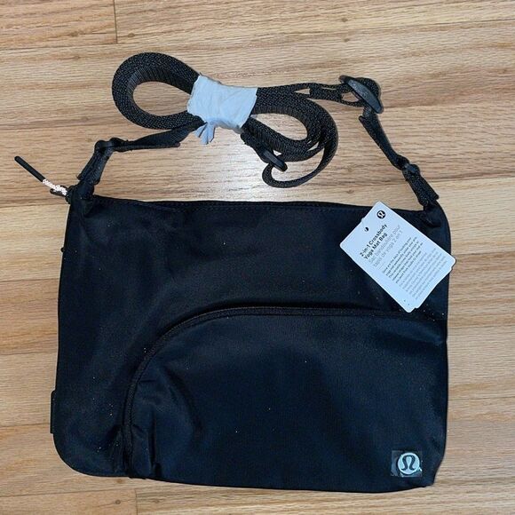 lululemon athletica Handbags - LULULEMON 2-in-1 Crossbody Yoga Mat Bag Black 3 L NWT